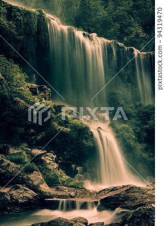 Beautiful waterfall in deep forest like a paradise. 2D Illustration. 94319470