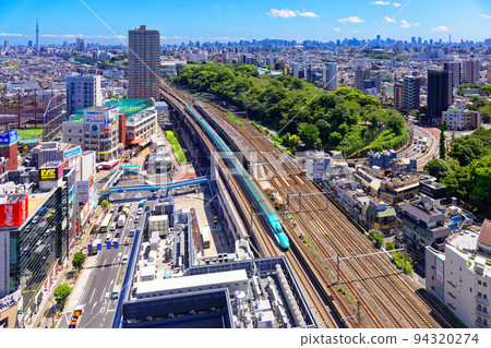 View of the Tohoku Shinkansen and Tokyo Skytree from Kitatopia 94320274