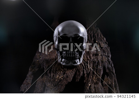 Halloween human skull on an old wooden table over black background. Shape of skull bone for Death head on halloween festival which show horror evil tooth fear and scary with fog smoke, copy space Halloween human skull on an old wooden table over black background. Shape of skull bone for Death head on halloween festival which show horror evil tooth fear and scary with fog smoke, copy space 94321145