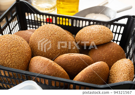 sesame bread in baking black box in kitchen 94321567