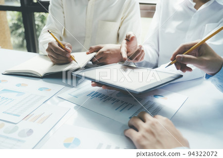 Startup asian business teamwork concept discussing graphs showing the results. 94322072