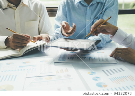 Startup asian business teamwork concept discussing graphs showing the results. Startup asian business teamwork concept discussing graphs showing the results. 94322073