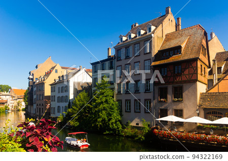 Houses and canals of French town Strasbourg 94322169