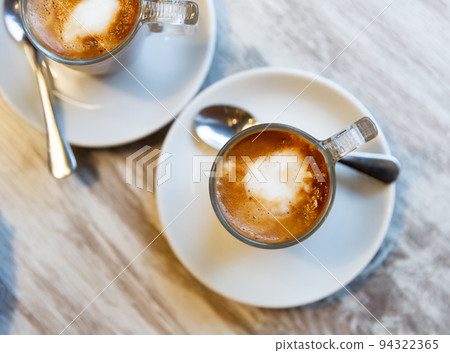 Freshly prepared cortado coffee in cup 94322365