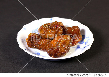 Candied figs on a plate Candied figs on a plate 94326894