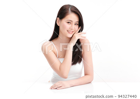Beautiful young asian woman with clean fresh skin on white background, Face care, Facial treatment, Cosmetology, beauty and spa, Asian women portrait. Beautiful young asian woman with clean fresh skin on white background, Face care, Facial treatment, Cosmetology, beauty and spa, Asian women portrait. 94327440