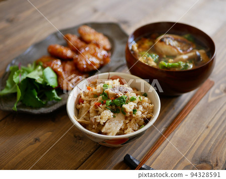 table with cooked rice table with cooked rice 94328591