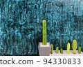 Green cactus on the blue cement wall background, background texture modern design 94330833