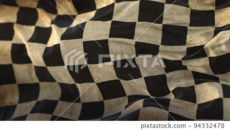 Old Checkered Flag waving at wind 94332478