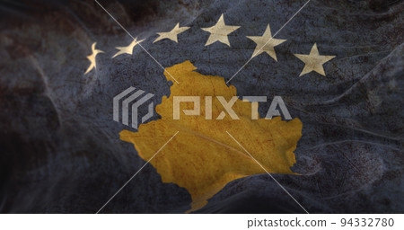 Old flag of Kosovo waving 94332780