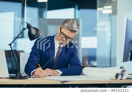 Experienced architect designer head working on projector portrait close up photo 94335231