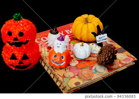 Taking pictures of small items for Halloween (pumpkins, cookbooks) Taking pictures of small items for Halloween (pumpkins, cookbooks) 94336083