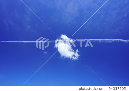 Contrails and floating clouds from highway parking Contrails and floating clouds from highway parking 94337205