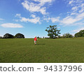 A boy who runs the lawn 94337996
