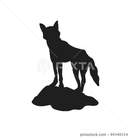 Dingo on rock black silhouette. Isolated australian dog. Young wolf on hill. Wildlife scenery. Wild fox portrait 94340314