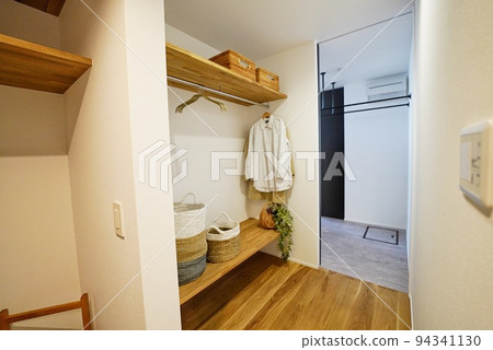 A new house with a walk-in closet at the entrance 94341130