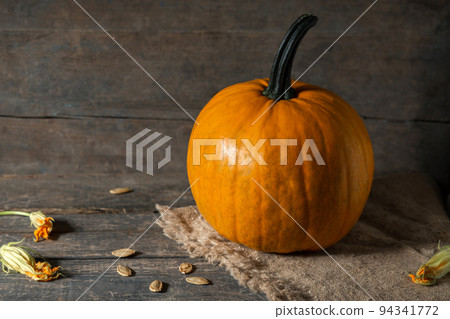 Pumpkin orange on wooden boards for halloween holiday 94341772