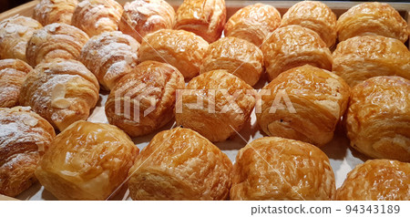 Assorted fresh baked sweet puff pastry stuffed with fruit and jelly and danish chocolate fill pastry, super delicious warm fresh buttery French and American baked pastries are enjoyed world wide on ba 94343189