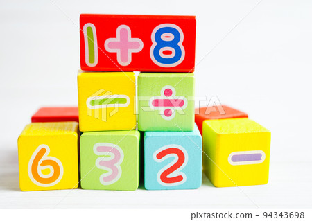 Number wood block cubes for learning Mathematic, education math concept. 94343698