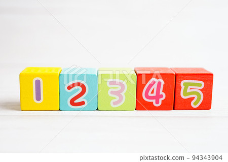 Number wood block cubes for learning Mathematic, education math concept. 94343904