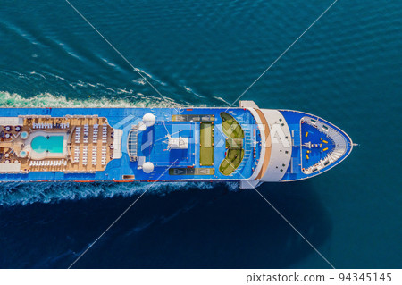 Luxury passenger liner in the bay of Kotor with travel returning after the Covid 19 pandemic Portrait of a disgruntled girl sitting at a cafe table Luxury passenger liner in the bay of Kotor with travel returning after the Covid 19 pandemic Portrait of a disgruntled girl sitting at a cafe table 94345145