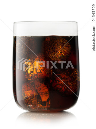 Cola soda soft drink with ice cubes in large glass on white. 94345709