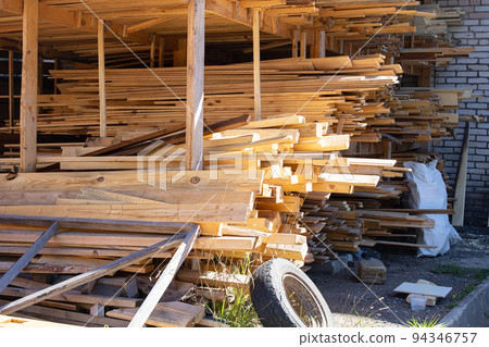 Folded finished boards at the sawmill closeup Folded finished boards at the sawmill closeup 94346757
