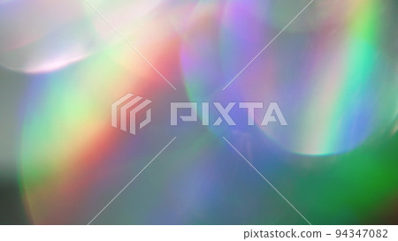 Psychedelic background, mix of shimmering bokeh. 94347082