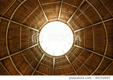 Steel roof trusses with primer paint with a round hole in the center. 94350005