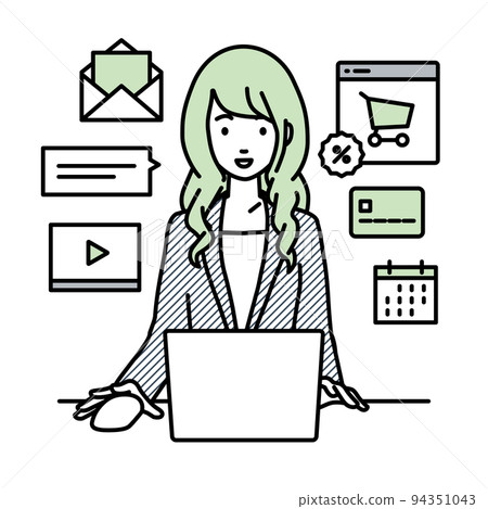 A woman in a suit sitting at a desk and doing an online shop or marketing job on a PC 94351043