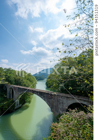 The beautiful arch-shaped third Otofuke River Bridge over the Otofuke River on the former Japanese National Railways Shihoro Line｜Kamishihoro Town, Hokkaido 94351319