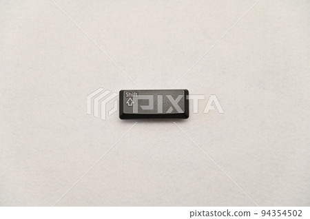 One key top of Shift key placed on white background 94354502