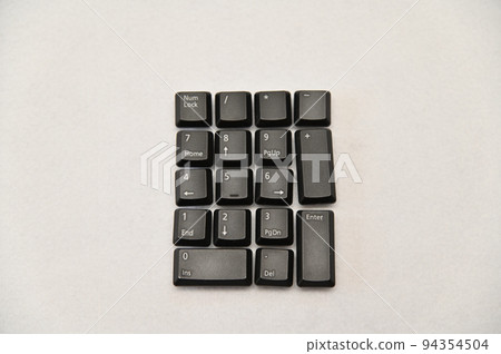 Numeric key top placed on a white background 94354504