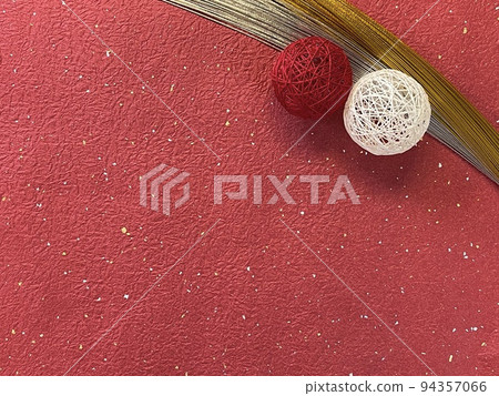 Dark vermillion Japanese paper with gold powder pattern and festive accessories 94357066