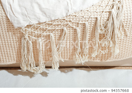 natural cotton house textile with woven macrame fringes. eco scandinavian style home design. boho bedding and decorative fabric natural cotton house textile with woven macrame fringes. eco scandinavian style home design. boho bedding and decorative fabric 94357668