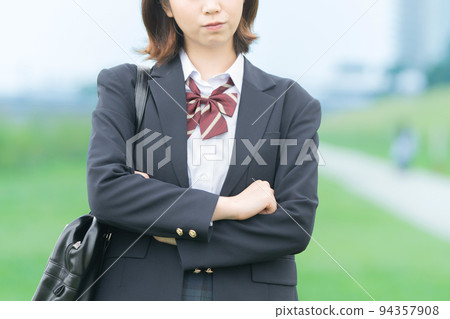 A high school girl giving a hand sign of refusal 94357908