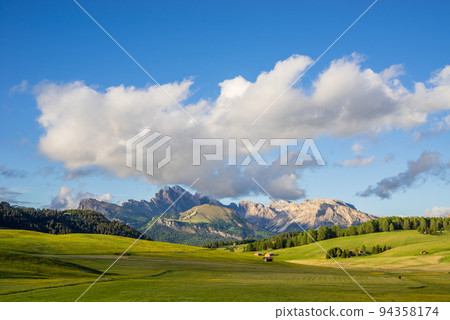 Mt.Langkofel at sunset, view from Seiser Alm, Dolomites, Italy Mt.Langkofel at sunset, view from Seiser Alm, Dolomites, Italy 94358174