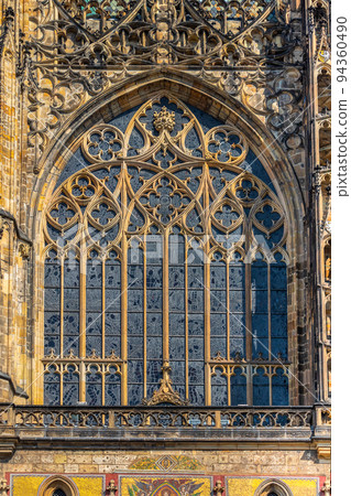 Ornate gothic window, detail of the gothic architecture of St. Vitus Cathedral, Prague, Czech republic 94360490
