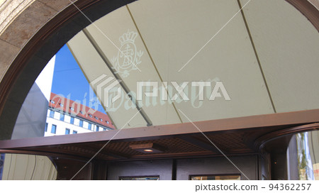 MUNICH, GERMANY - 12 OCT 2015: Exterior view of the Alois Dallmayr Haus in downtown Munich. Dallmayr is a German delicatessen and one of the best-known German coffee brands 94362257