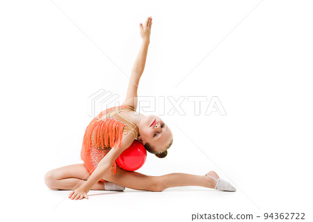 Flexible gymnastic girl bend back with ball Flexible gymnastic girl bend back with ball 94362722