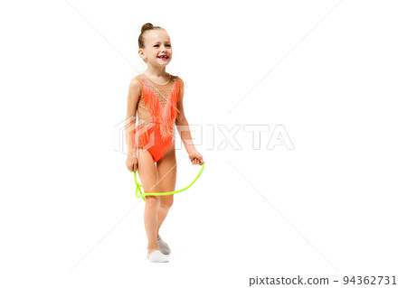 Happy female sporty child jump with rope Happy female sporty child jump with rope 94362731