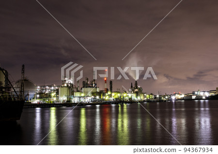 Sea and factory night view Sea and factory night view 94367934