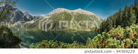 Tatra National Park, Poland. Panorama Famous Mountains Lake Morskie Oko Or Sea Eye Lake In Summer Morning. Five Lakes Valley. Beautiful Scenic View. European Nature 94369229