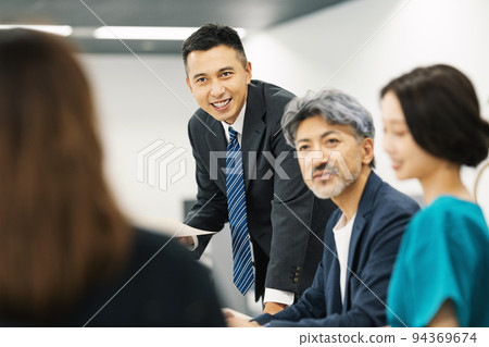 business people talking at a meeting 94369674