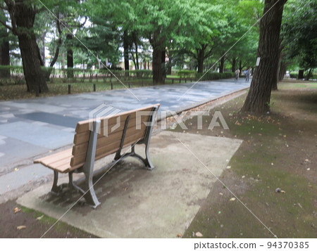 A spacious park bench A spacious park bench 94370385