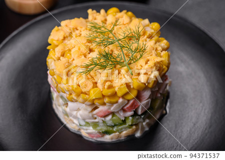 Fresh vegetable salad with corn, pepper, crab, cucumber, eggs and mayonnaise Fresh vegetable salad with corn, pepper, crab, cucumber, eggs and mayonnaise 94371537