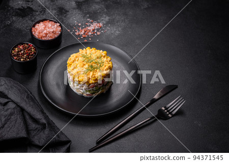 Fresh vegetable salad with corn, pepper, crab, cucumber, eggs and mayonnaise Fresh vegetable salad with corn, pepper, crab, cucumber, eggs and mayonnaise 94371545