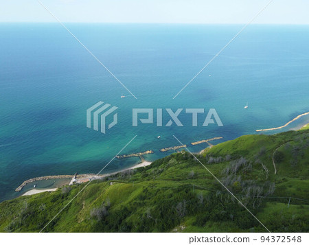 Aerial view of the sea and the mountains near Rimini, Italy 94372548