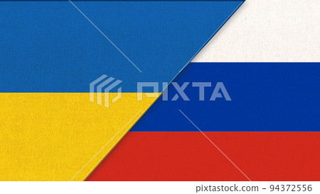 Flag of Ukraine and Russia. Ukrainian and Russian state flags. Fabric Texture Flag of Ukraine and Russia. Ukrainian and Russian state flags. Fabric Texture 94372556