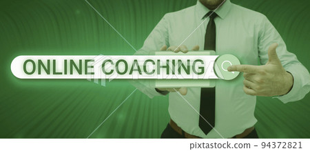 Hand writing sign Online CoachingLearning from online and internet with the help of a coach. Business concept Learning from online and internet with the help of a coach Hand writing sign Online CoachingLearning from online and internet with the help of a coach. Business concept Learning from online and internet with the help of a coach 94372821